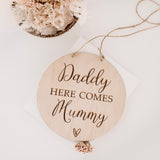 Daddy here comes mummy Plaque